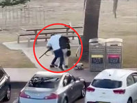 man taking gun away from shooter in bondi beach mass shooting in Australia 